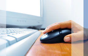 image showing a person using a computer and mouse